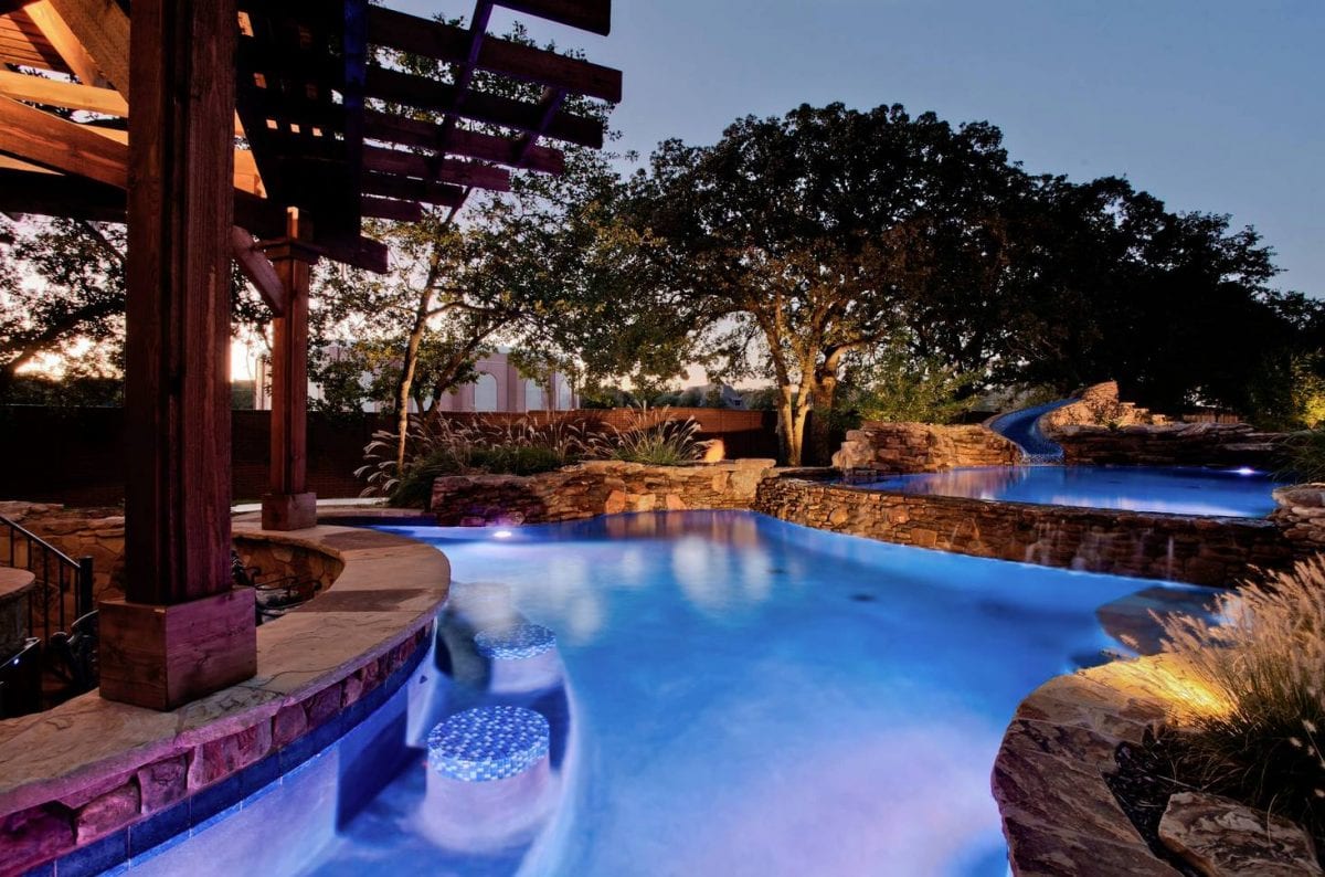 Home Improvement Tips on How to Increase Your Home's Resale Value Home Improvement Tips - Beautiful home with upgraded pool in the backyard