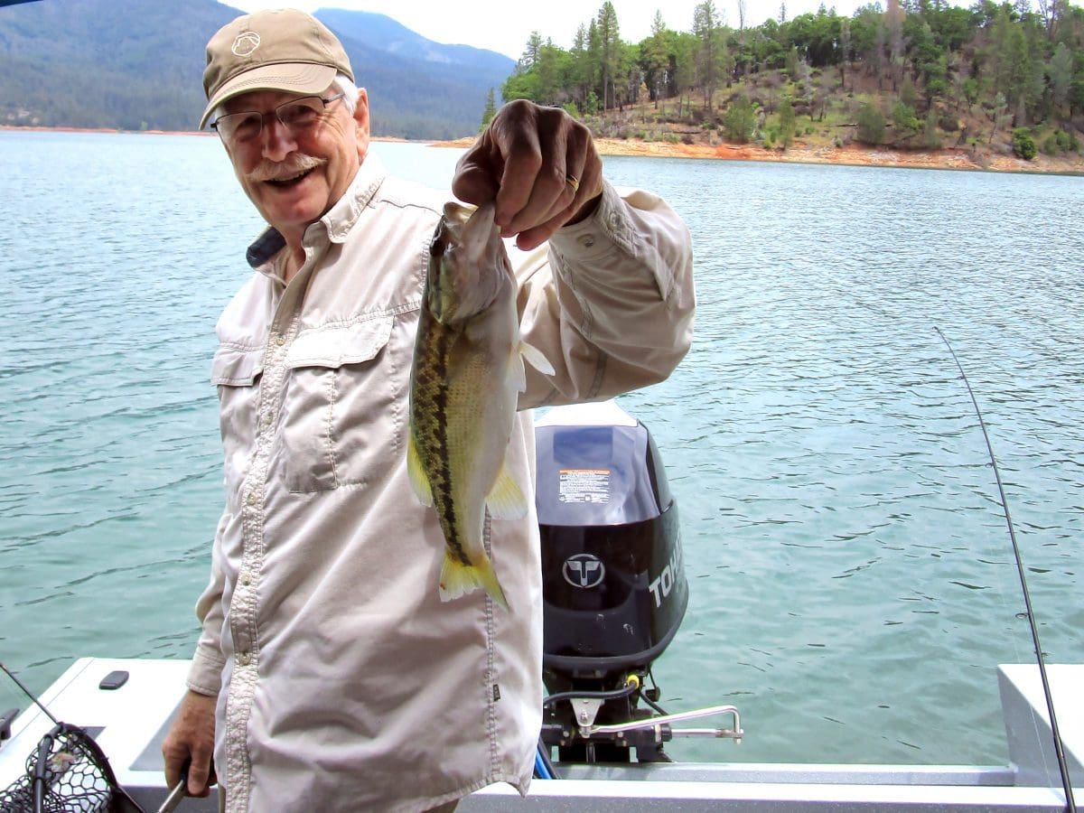 Ken and a spotted bass