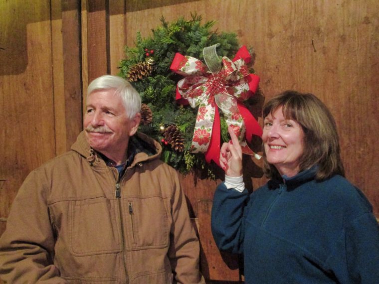 Ken and Libby Guthrie with their finished Christmas wreath